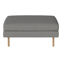 Gray upholstered ottoman with a smooth texture and light wooden legs. Stylish, minimalistic design for modern decor.