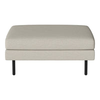 Light beige upholstered ottoman with a smooth texture and sleek black metal legs. Ideal for modern decor.
