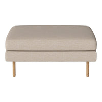 Beige upholstered ottoman with smooth texture and light wood legs. Ideal for modern living spaces.