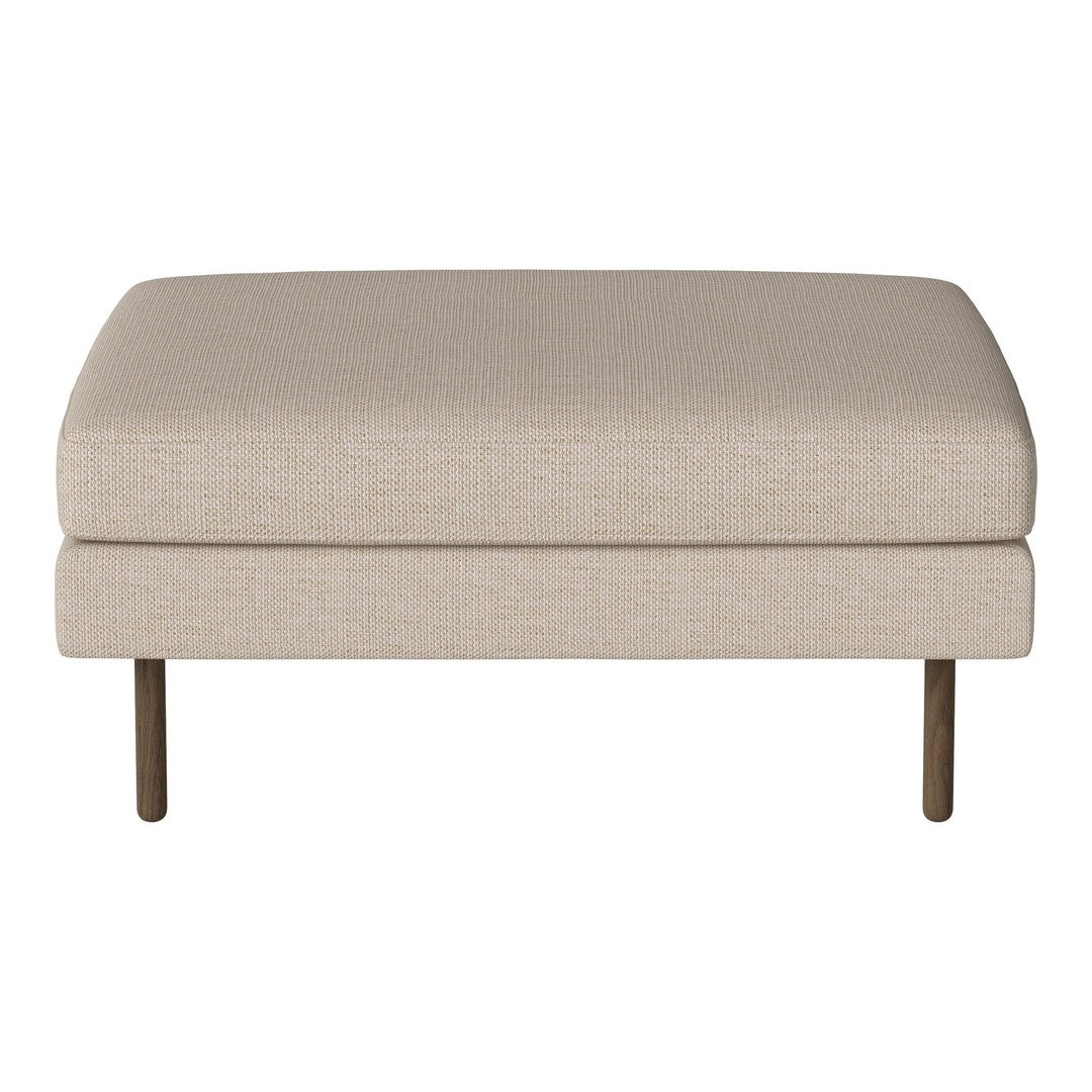 Beige upholstered ottoman with a smooth textile finish and sleek metal legs. Simple, modern design for versatile decor.