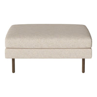 Beige upholstered ottoman with subtle texture and sleek metal legs, perfect for modern home decor.