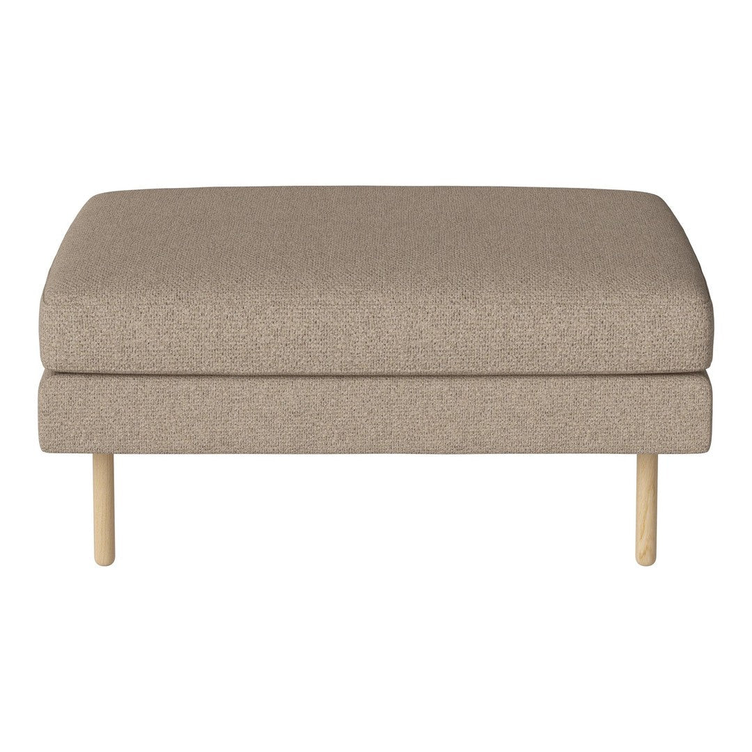 Beige upholstered ottoman with a smooth, minimalist design and natural wooden legs.