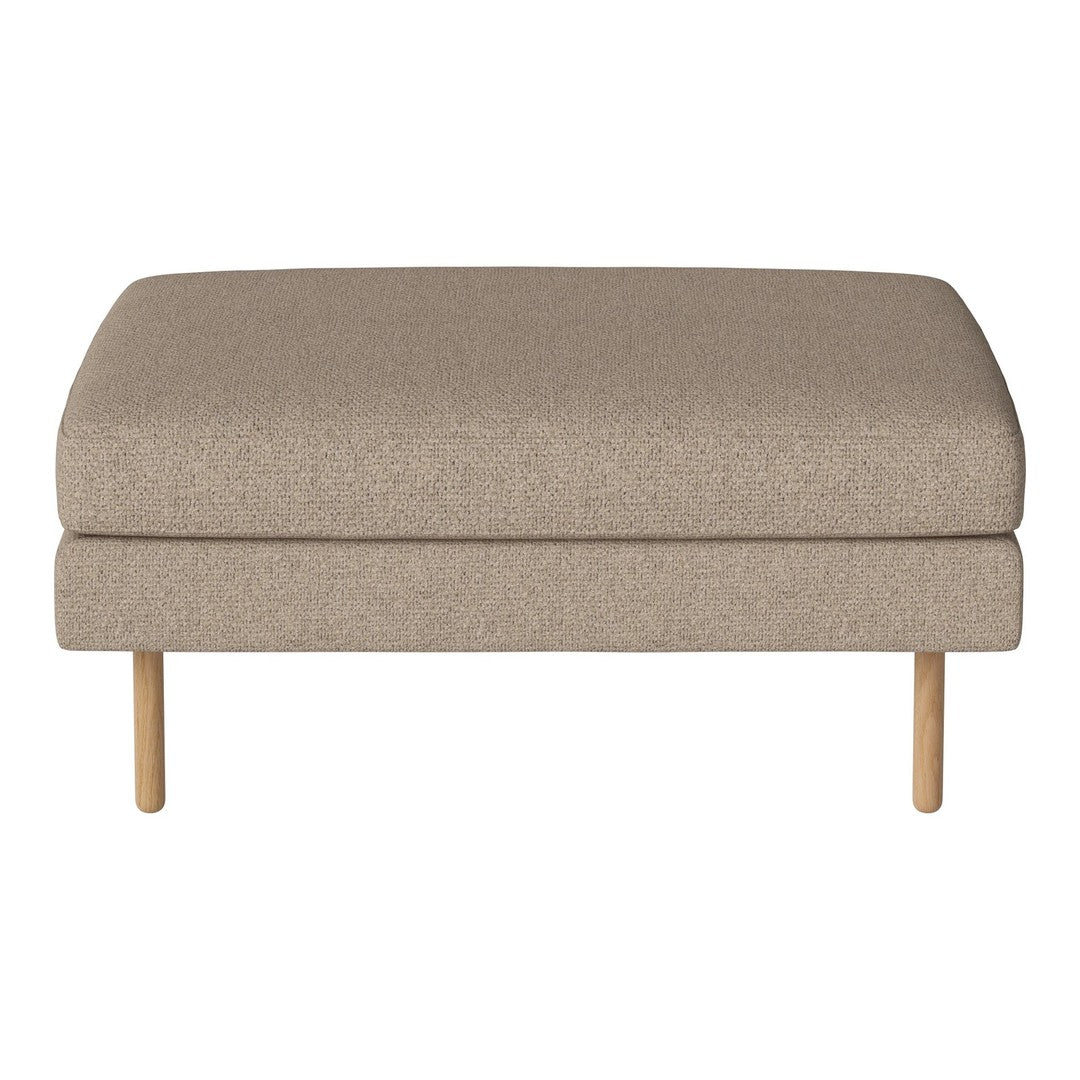 Beige upholstered ottoman with a smooth fabric texture and natural wood legs, perfect for modern decor.