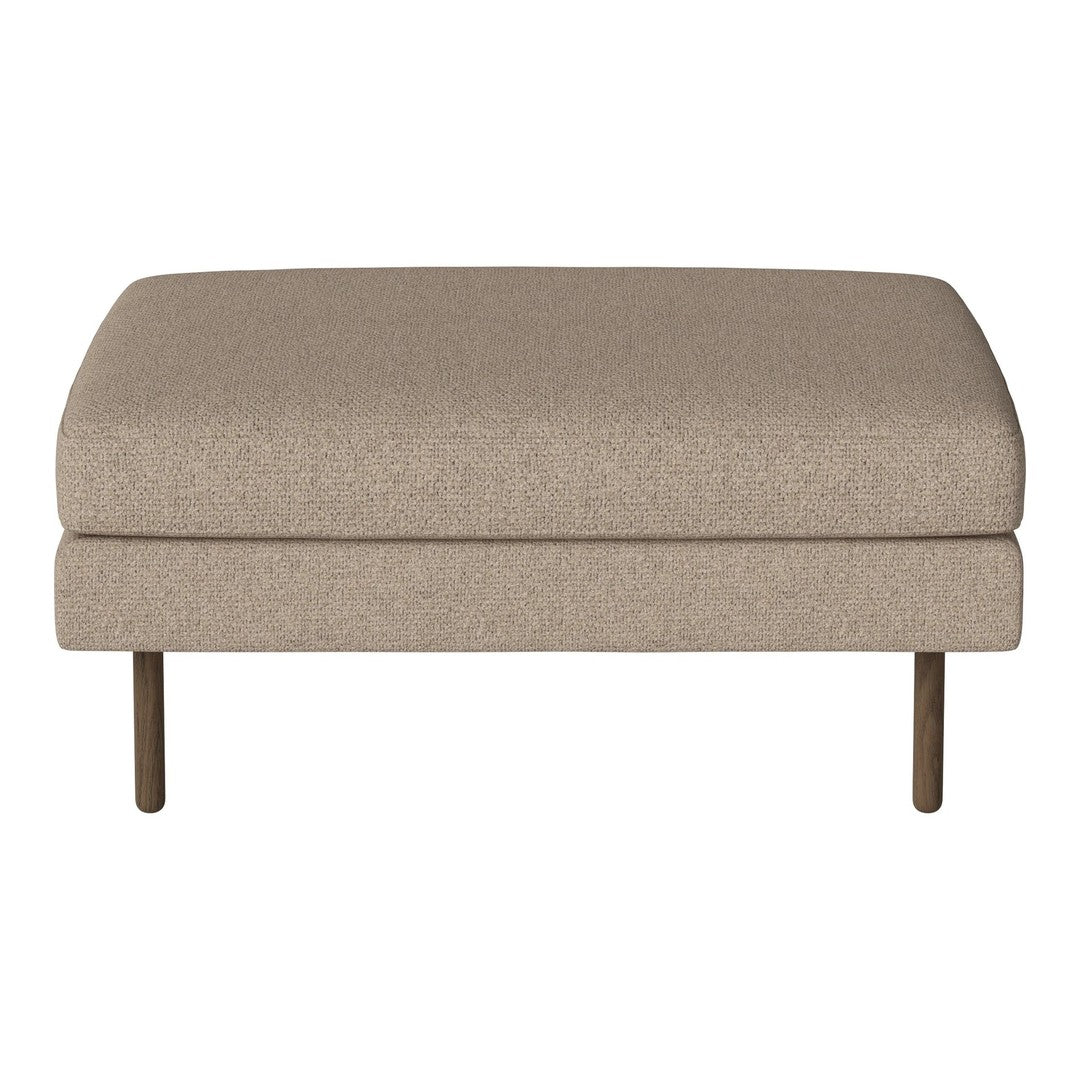Beige upholstered ottoman with a smooth surface and wooden legs, ideal for modern living spaces.
