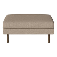 Beige upholstered ottoman with a smooth surface and wooden legs, ideal for modern living spaces.