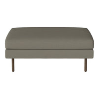 "Modern gray upholstered ottoman with a smooth texture and wooden legs."