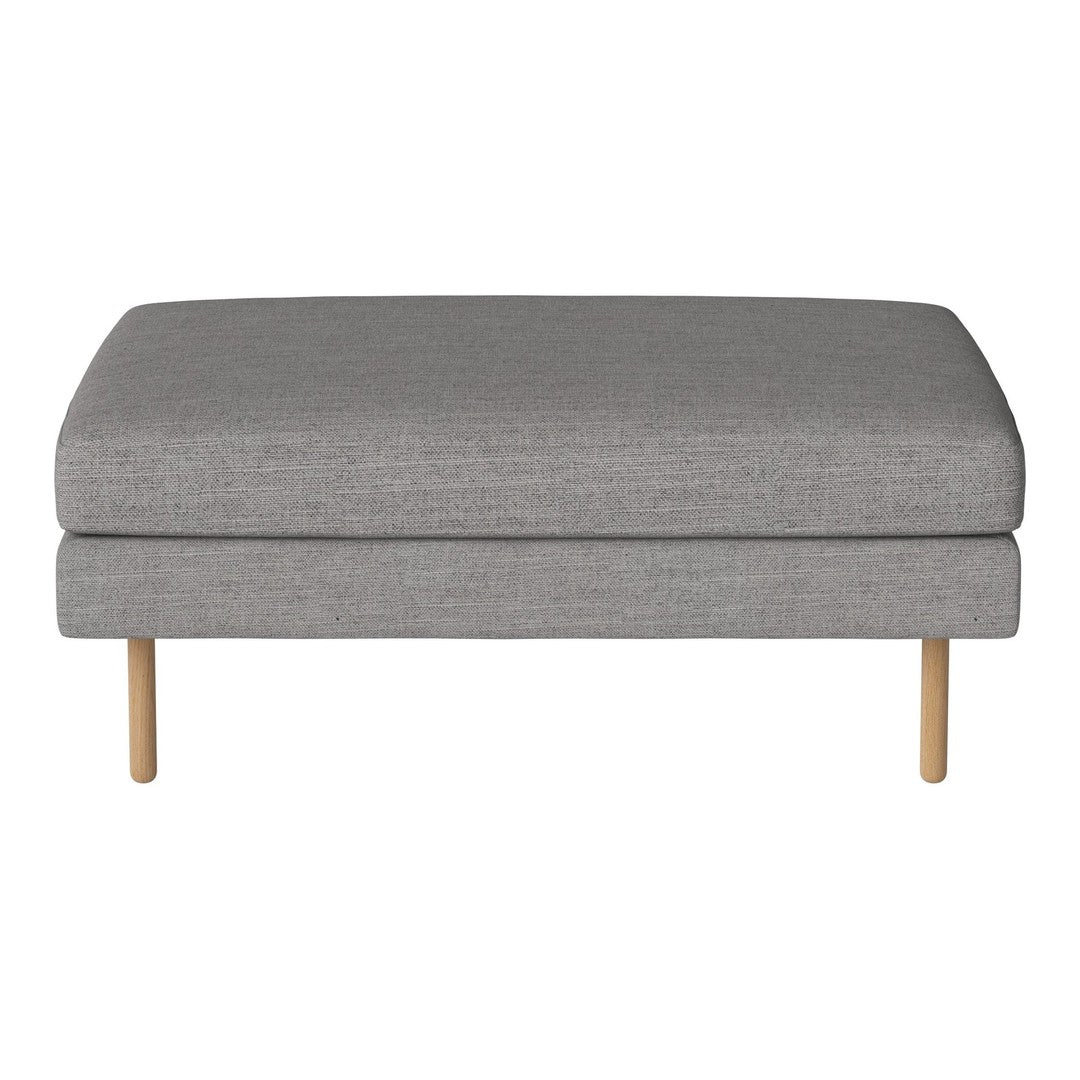 Gray upholstered ottoman with a smooth texture and minimalist design, featuring natural wooden legs.
