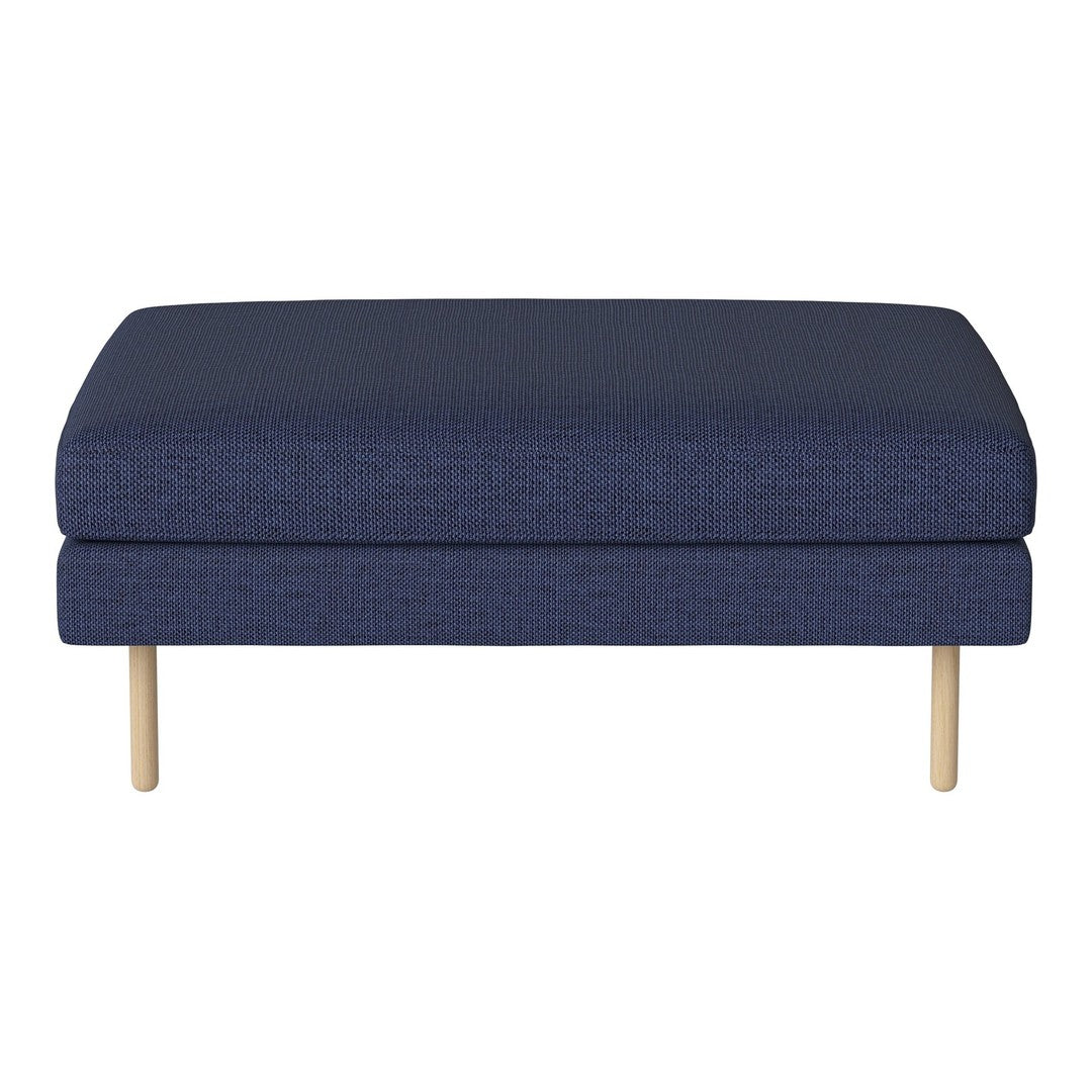 Blue upholstered ottoman with a textured pattern and light wooden legs, perfect for modern living spaces.