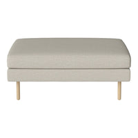 Light gray upholstered ottoman with a smooth texture and natural wooden legs, perfect for any modern decor.