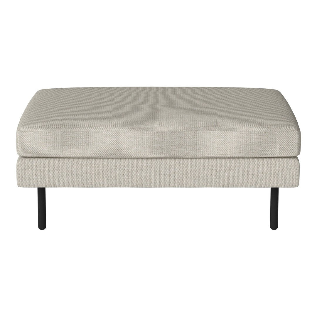 Light beige upholstered ottoman with a smooth texture and black metal legs. Simple and modern design.