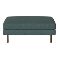 Teal upholstered ottoman with a textured pattern and sleek metal legs, perfect for modern home decor.