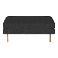 Dark gray upholstered ottoman featuring a simple, textured pattern with natural wood legs.
