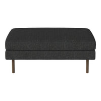 Stylish dark gray upholstered ottoman with subtle woven texture and sleek metal legs. Perfect for modern decor.
