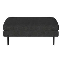 Black upholstered ottoman with a smooth texture and sleek minimalist design. Perfect for modern interiors.