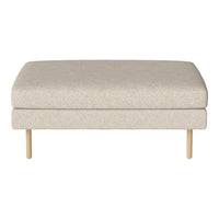 Beige upholstered ottoman with subtle texture and wooden legs, perfect for modern living spaces.