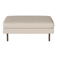 Neutral beige ottoman with a smooth, textured fabric and minimalist design, featuring sleek metal legs.