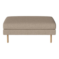 Beige upholstered ottoman with a smooth, textured surface and light wooden legs. Ideal for versatile decor.