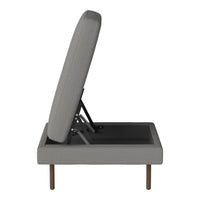 Gray upholstered sofa bed with clean lines and a modern design, featuring a textured surface and minimalist wooden legs.
