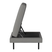 Gray upholstered bed frame with sleek design and black metal legs, featuring a minimalist, contemporary pattern.