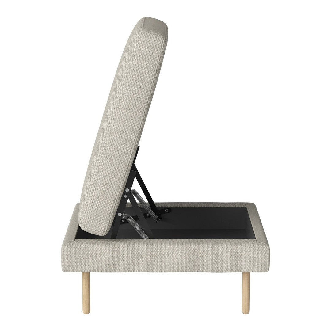 Light beige fabric upholstered chaise lounge with a minimalist design and natural wood legs. Elegant and modern style.