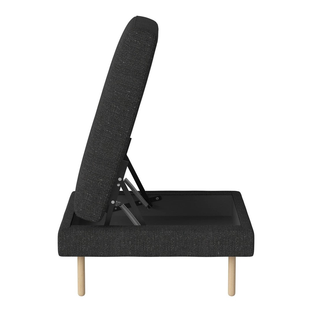 Stylish black fabric chaise lounge with a subtle pattern and natural wood legs, perfect for modern decor.