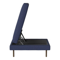 Navy blue upholstered folding chair with a textured pattern and sleek black legs.