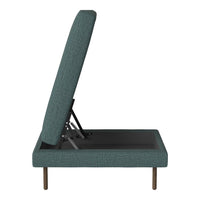 Teal upholstered couch with a textured fabric and mid-century wooden legs, showcasing a modern, minimalist design.
