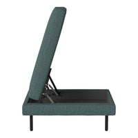Teal upholstered adjustable chair with a textured pattern and black metal base. Ideal for modern decor.