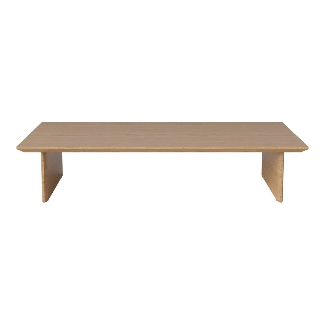 Light wood coffee table with a smooth finish and minimalist design, featuring clean lines and a neutral color palette.