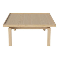 Light oak coffee table with a smooth, natural wood grain and minimalist design.