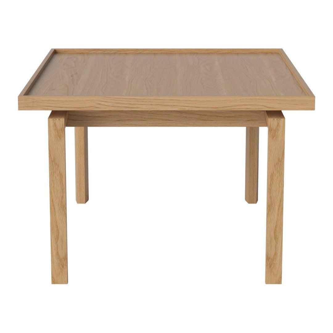 Natural oak wood table with a smooth, light finish and minimalist design; perfect for modern decor.