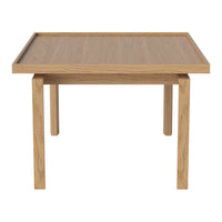 Natural oak wood table with a smooth, light finish and minimalist design; perfect for modern decor.