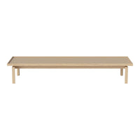 Light beige rectangular table with a smooth surface and simple, clean lines; modern minimalist design.