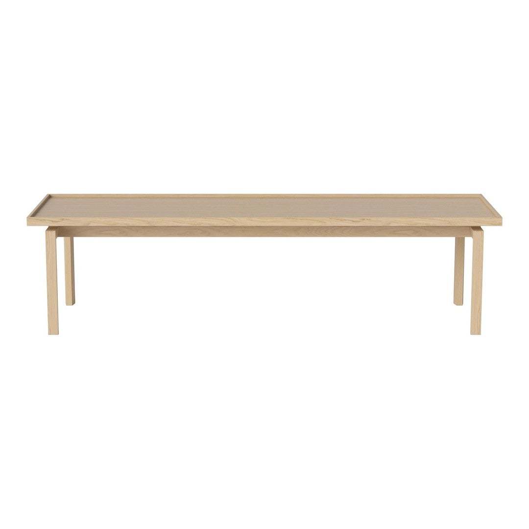 Light wooden table with a smooth, minimalist design and natural grain pattern, ideal for modern decor.