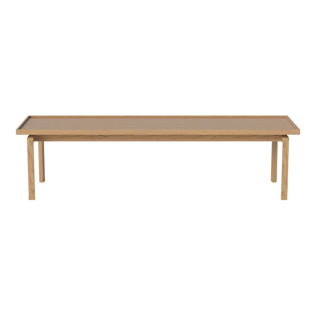 Natural wood grain table in a light beige finish with a smooth, minimalist design and clean lines. 