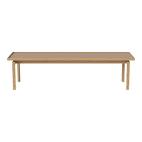 Natural wood grain table in a light beige finish with a smooth, minimalist design and clean lines. 