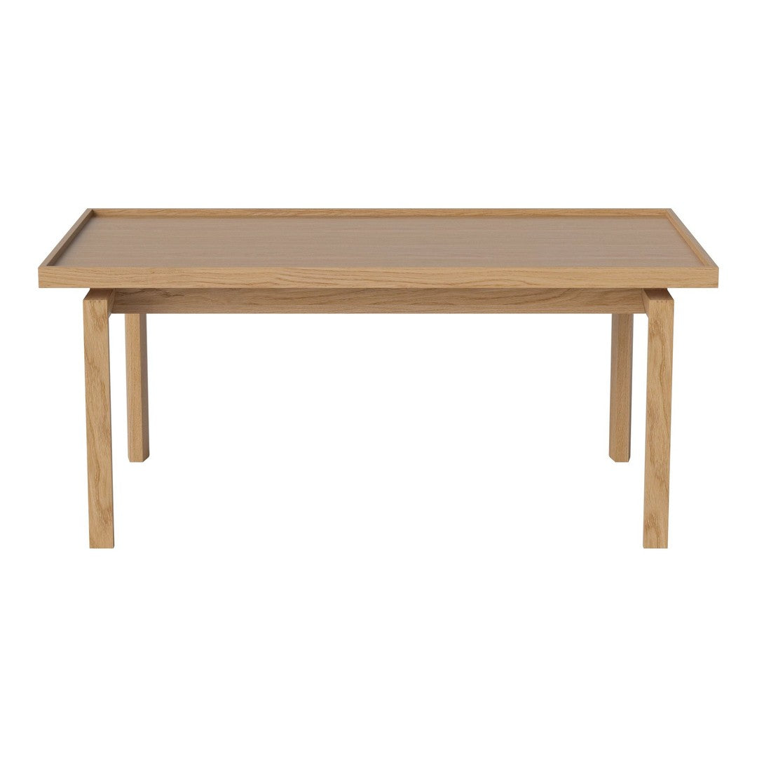 Light wood grain dining table with a smooth, natural finish and simple rectangular design.