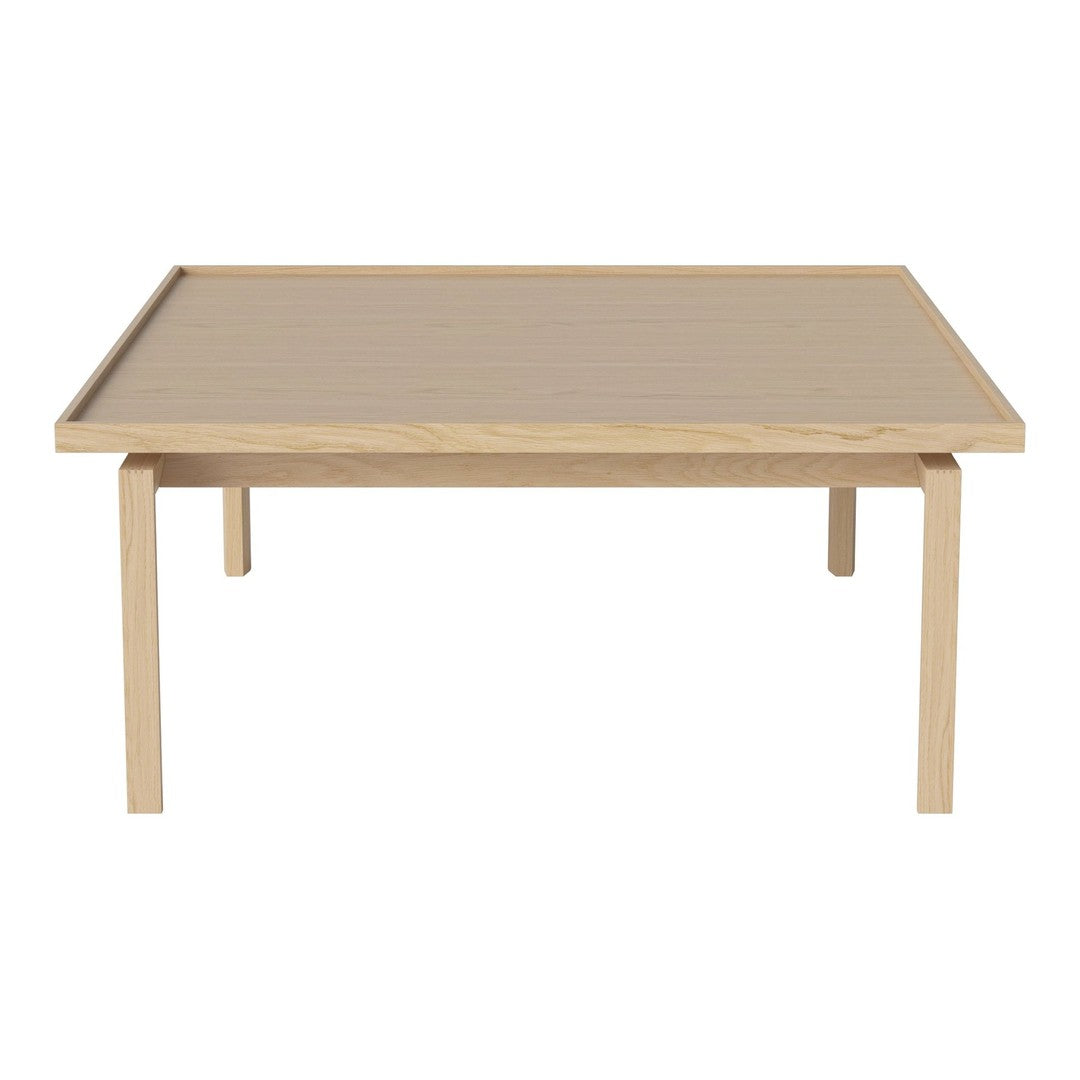 Light blonde wood coffee table with a smooth, minimalistic surface and simple rectangular design.