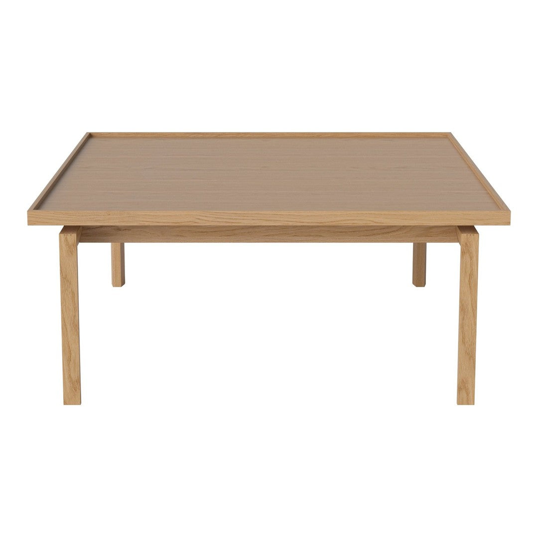 Light oak coffee table with a smooth, natural wood finish and minimalist design, showcasing clean lines and a simple aesthetic.