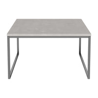 Gray concrete table with sleek silver metal frame, perfect for modern decor. Simple, minimalist design.