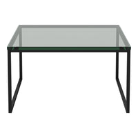 "Modern square coffee table with a sleek black frame and clear glass top."