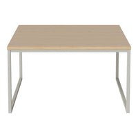 Light wood tabletop with a smooth finish, supported by a sleek silver metal frame. Simple and modern design.