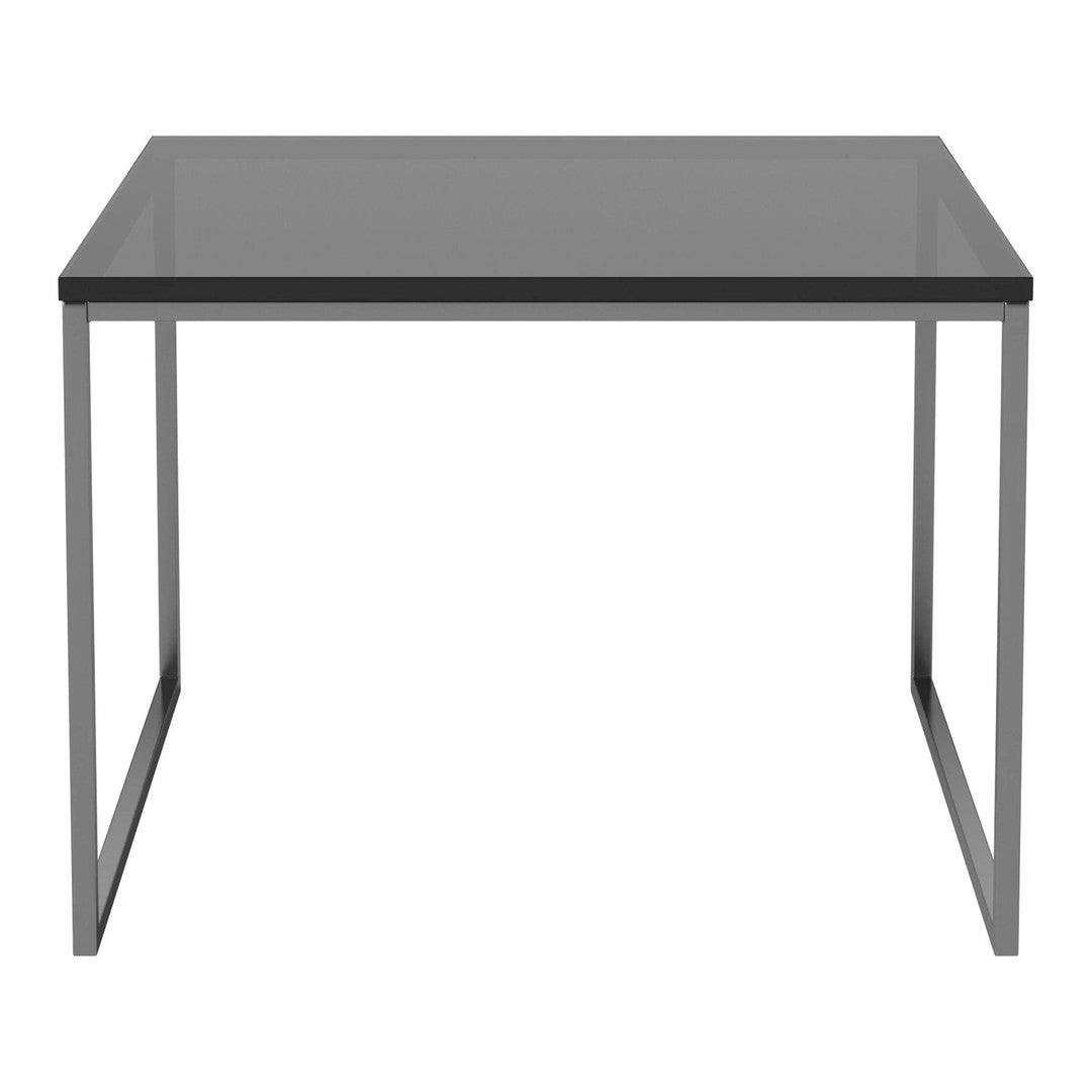 "Modern square table with a sleek gray top and minimalist silver legs, perfect for contemporary decor."