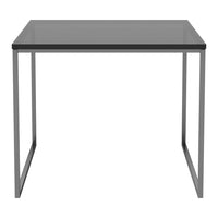 Modern gray square table with sleek metal legs, perfect for contemporary decor. Minimalist design with a smooth finish.
