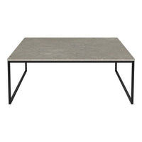 Gray concrete tabletop with a sleek black metal frame, offering a modern, minimalistic design. Ideal for contemporary spaces.