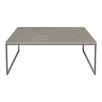 Gray stone tabletop with subtle patterns on a minimalist silver metal frame. Perfect for modern decor.