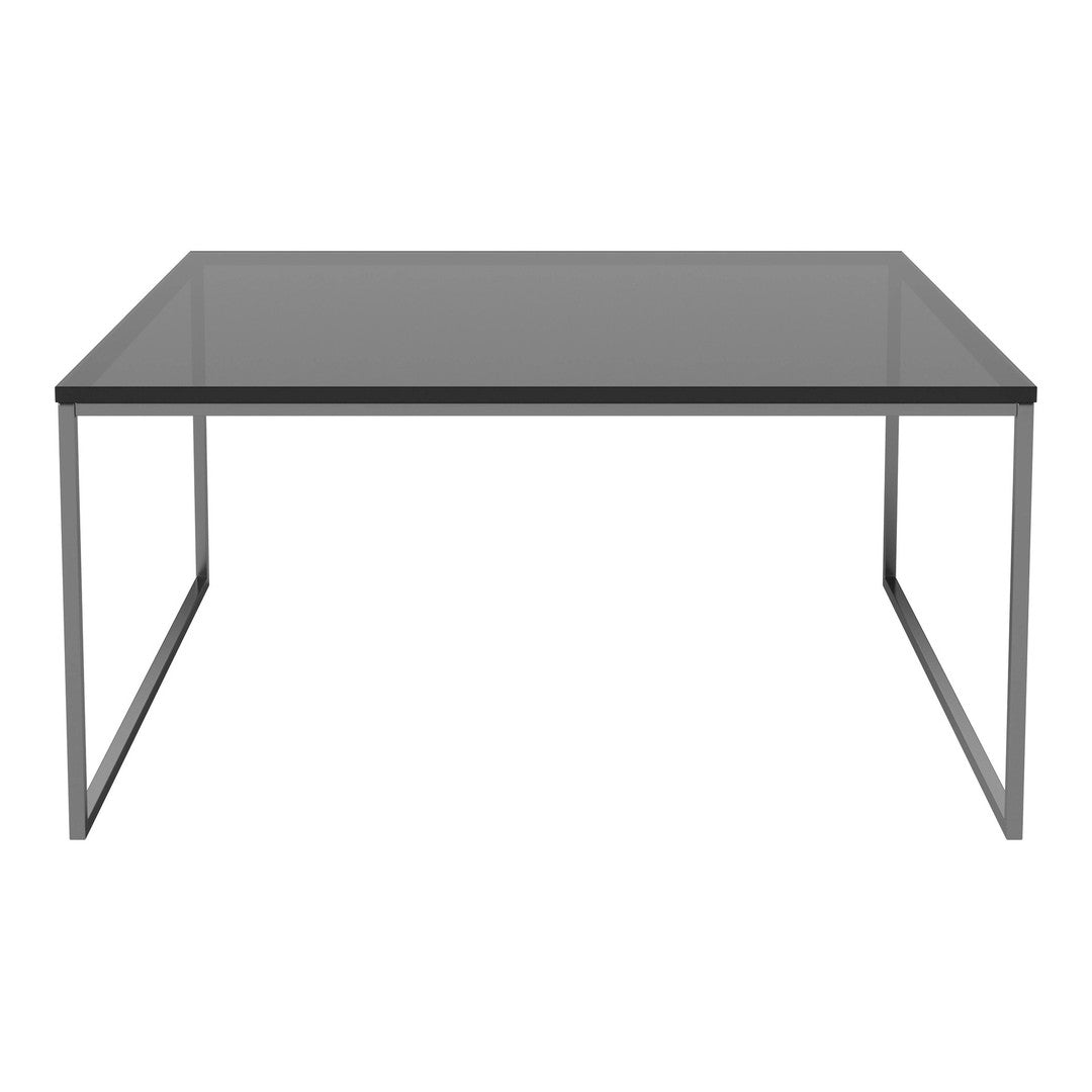 Modern gray glass top table with sleek silver frame, featuring a minimalist design and clean lines.