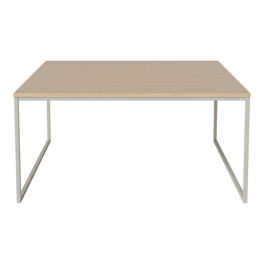 Modern rectangular table with a light wood top and minimalist silver metal frame, featuring a clean, neutral color palette.