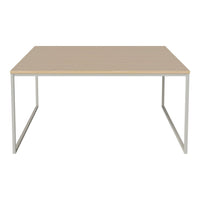 Modern rectangular table with a light wood top and minimalist silver metal frame, featuring a clean, neutral color palette.