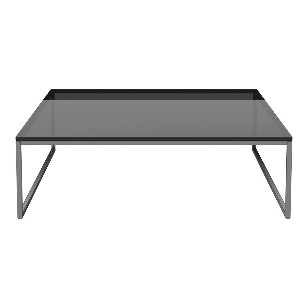 Sleek black coffee table with a smooth gray glass top and minimalist metal frame.